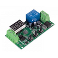 Electronic control board with digital display on a white background