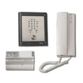 A Voig intercom system on a white background, showing a white wall-mounted receiver with coiled cord, a small white wall plate, and a black rectangular speaker box with a silver front panel.