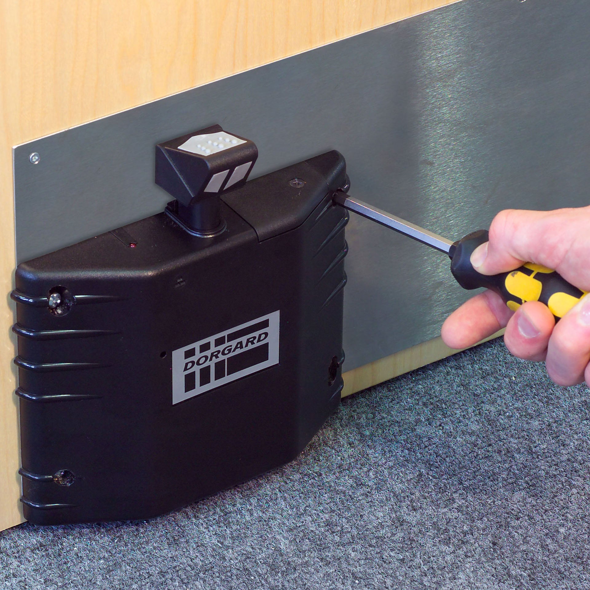 Installing a Fireco Dorgard SmartSound wireless fire door retainer